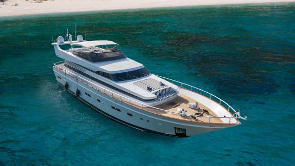 The Opera yacht is anchored in a bay, offering luxury and comfort.