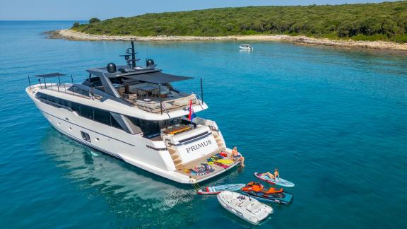Primus yacht Sanlorenzo SL96A offers jet skis and toys for active sea days.