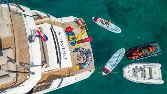 The Primus motor yacht offers a wide swim platform and water toys for unforgettable fun.
