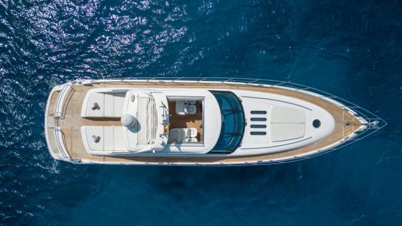 The foredeck and aft deck layout of Princess Juliet is seen from above while at sea in Ibiza.