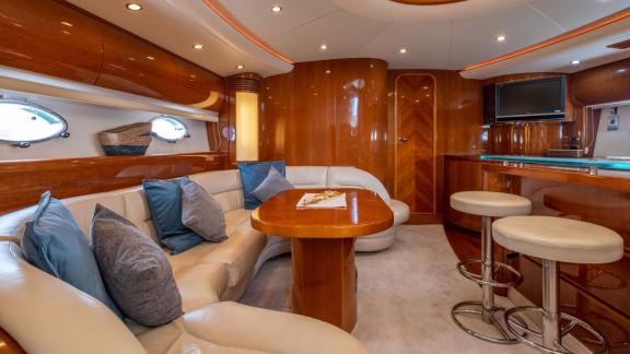 Princess Juliet features a comfortable lounge, dining table and stylish onboard bar in Ibiza.