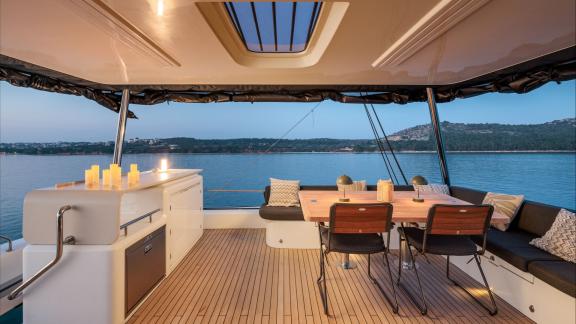 Among catamaran rental options in Kastela the upper deck seating areas of Princess Karla.