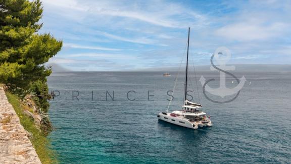 Catamaran Princess S anchored in the picturesque Split Bay, Croatia