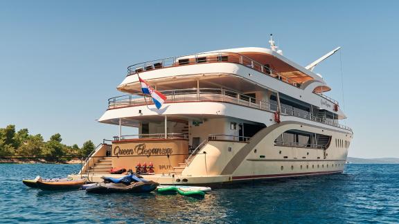 The motor yacht Queen Eleganza with water sports equipment anchored in Croatia