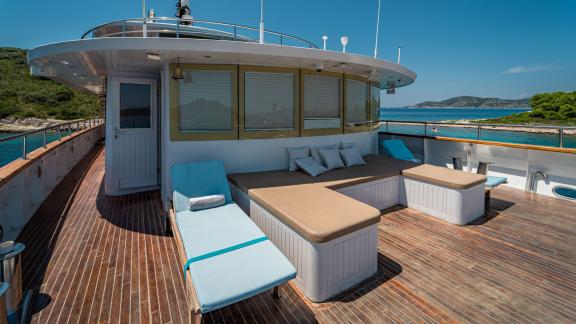 Relax on the spacious sun deck of the luxurious Motor Yacht Riva in Croatia.