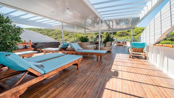 Experience comfort and style in the spacious relaxation area of the Motor Yacht Riva in Croatia.