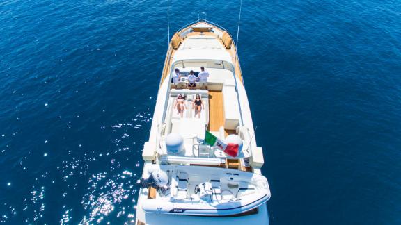 Enjoy the sun and sea with a luxury yacht rental in Naples aboard the Riviera.