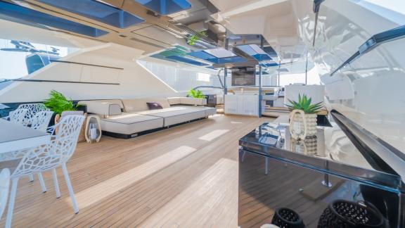 The upper deck of the Saffuriya yacht stands out with its modern design and spacious seating areas.