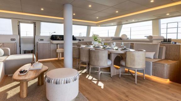 The catamaran Spice of Life offers a spacious dining setup with views near Athens.