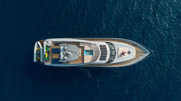 Top view of Stela 117 yacht, showcasing the spacious deck and swimming area.