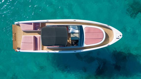 The aerial view of the Tequila motor yacht showcases spacious seating areas and sleek design.