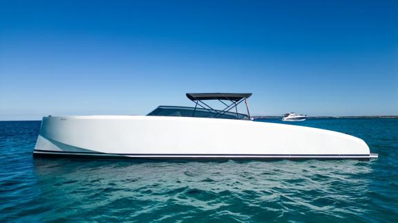 The Tequila motor yacht stands out with its minimalist and sleek design on calm waters.