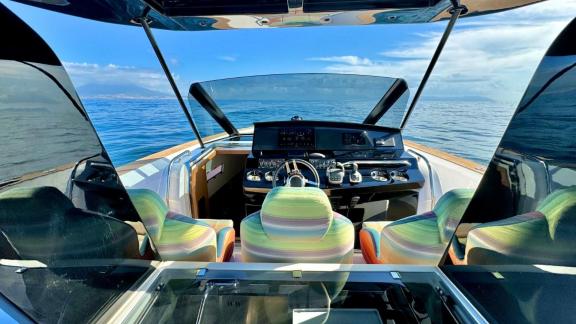 The modern helm of That's Amore offers the ultimate luxury yacht rental experience and an unforgettable time at sea in N