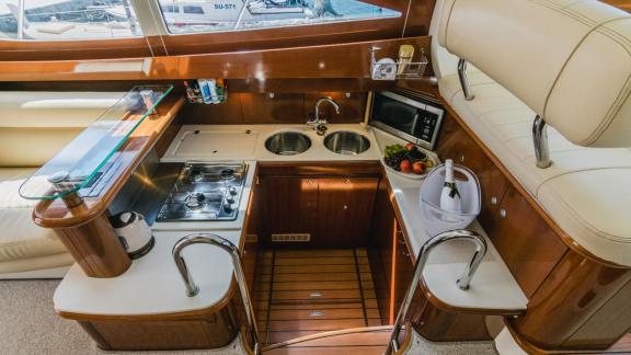 The kitchen of motor yacht Unplugged features a modern and functional design.