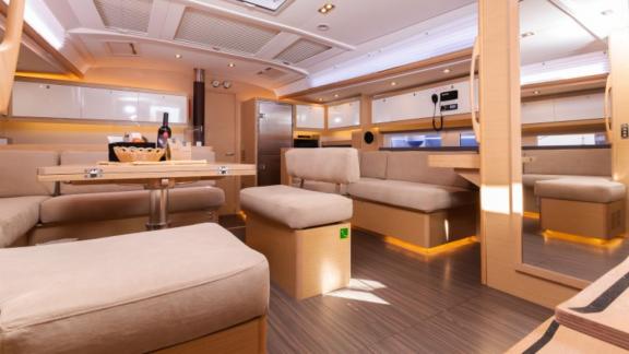 The spacious and modernly designed salon of the Vita yacht, featuring comfortable seating areas.