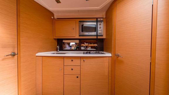 Fully equipped, stylish and modern kitchen area on motor yacht Xenia.