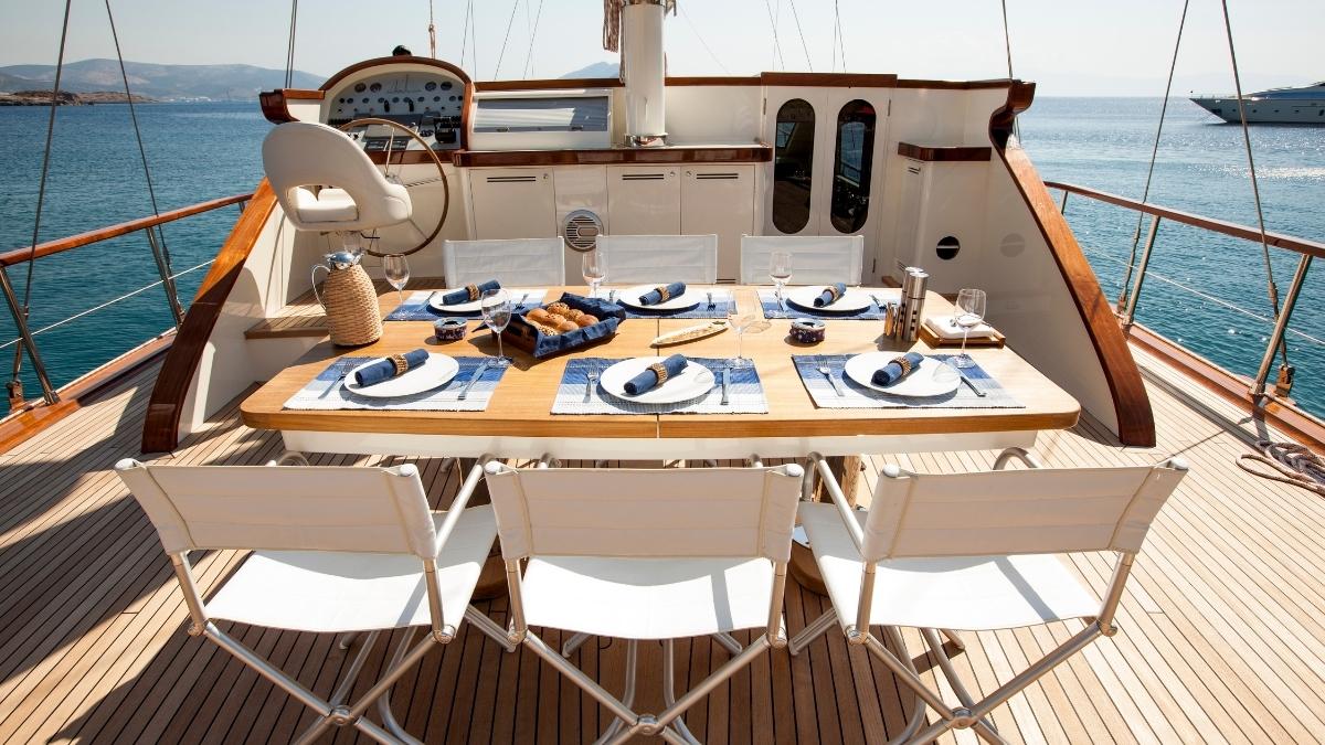 A festively laid table awaits you for lunch on board a gulet