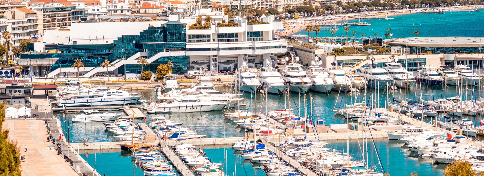 luxury yachts at the port of Cannes near the palais des festivals, ideal for yacht charter Cannes